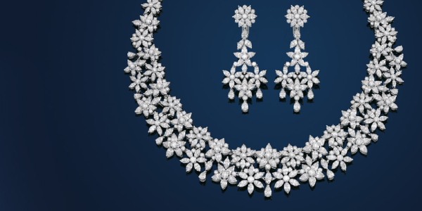 An Elegant Diamond Necklace Isolated In Black Background.