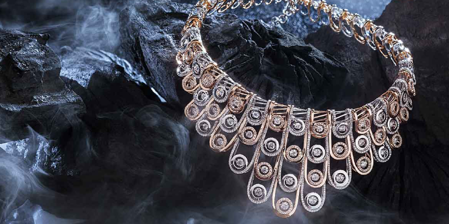 A Gorgeous Diamond Necklace Isolated On A Rock Background.